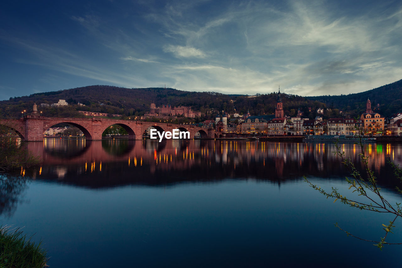 Panoramic view of heidelberg's old town with the castle at dusk, germany.