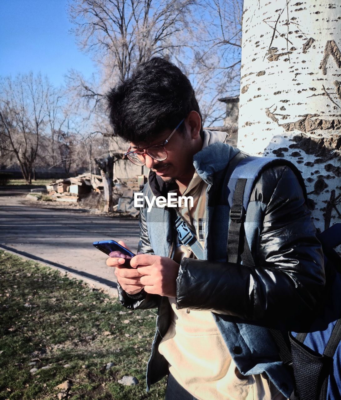 Young man using mobile phone