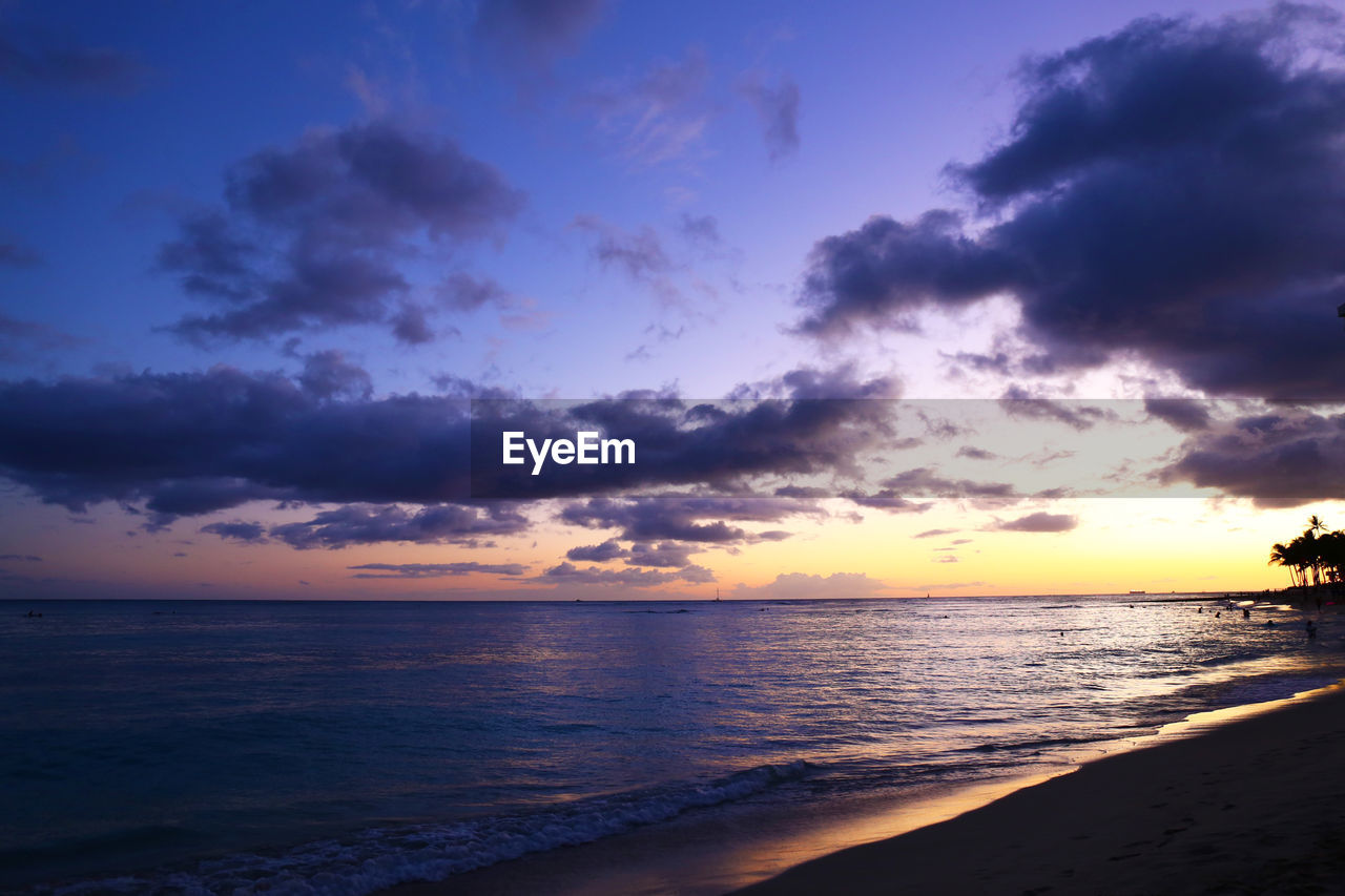 Scenic view of sea against sky during sunset