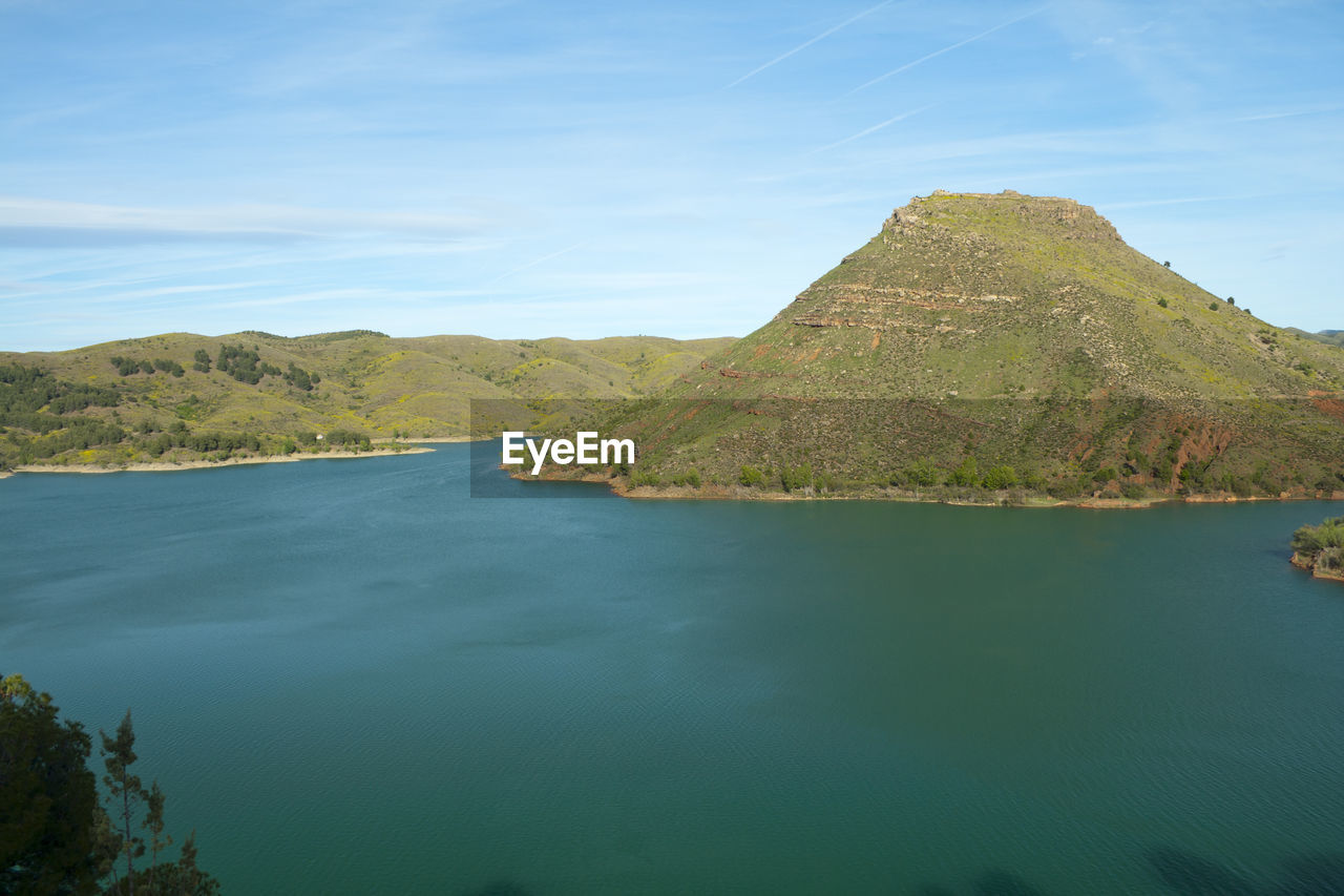 water, scenics - nature, sea, coast, beauty in nature, sky, mountain, nature, body of water, land, reservoir, environment, no people, tranquility, tranquil scene, bay, landscape, travel destinations, blue, travel, day, terrain, cloud, outdoors, non-urban scene, cliff, tourism, shore, beach, idyllic, reflection, coastline, plant, mountain range, island, rock, tree