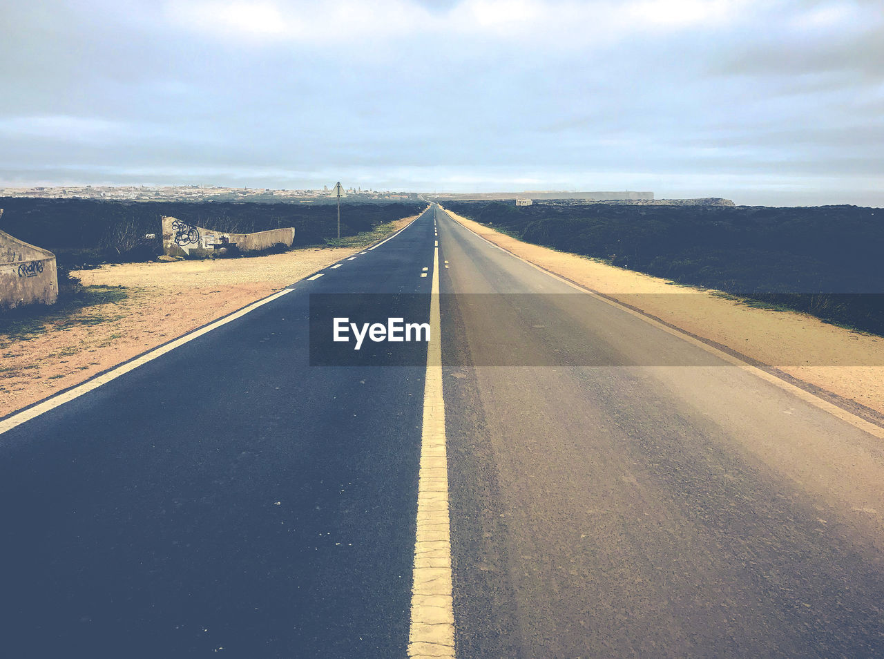 ROAD LEADING TOWARDS LANDSCAPE