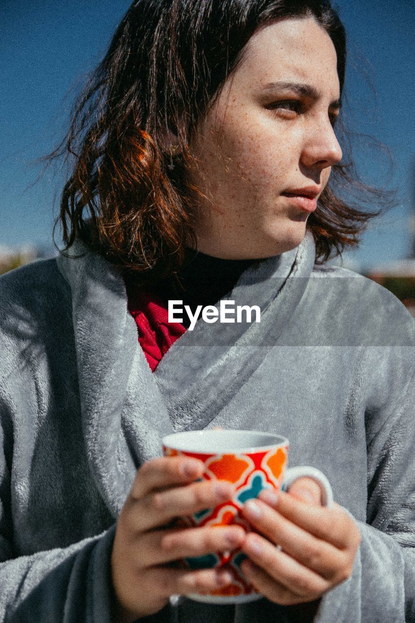 Close-up of a woman drinking glass