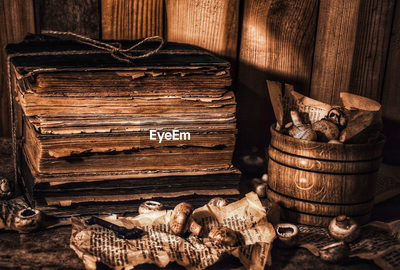 CLOSE-UP OF BOOKS ON TABLE