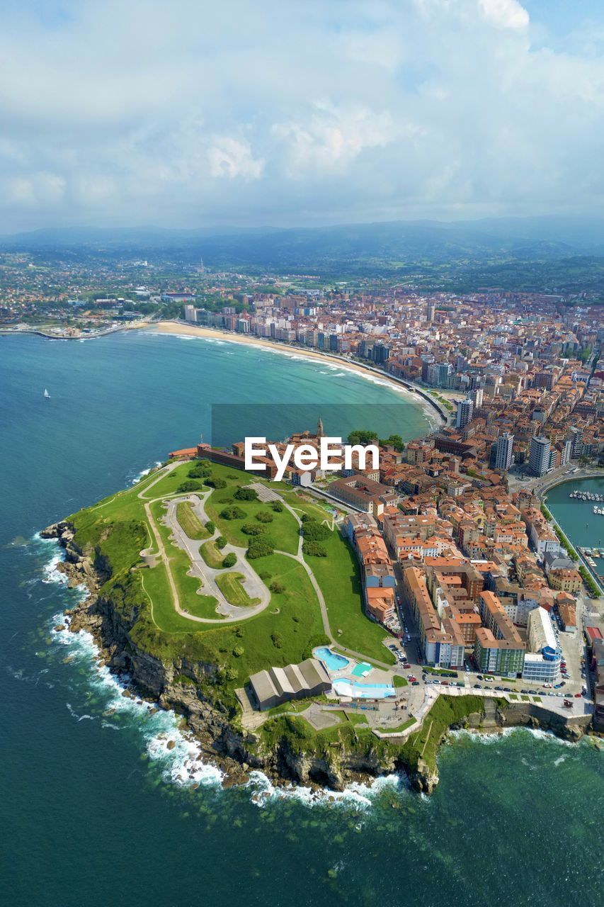 Drone view of a seaside town, gijon, in spain