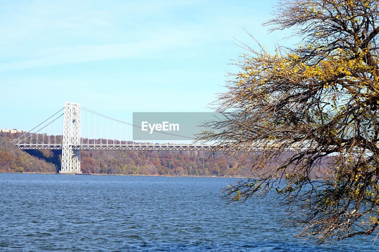 George washington bridge over hudson river against sky