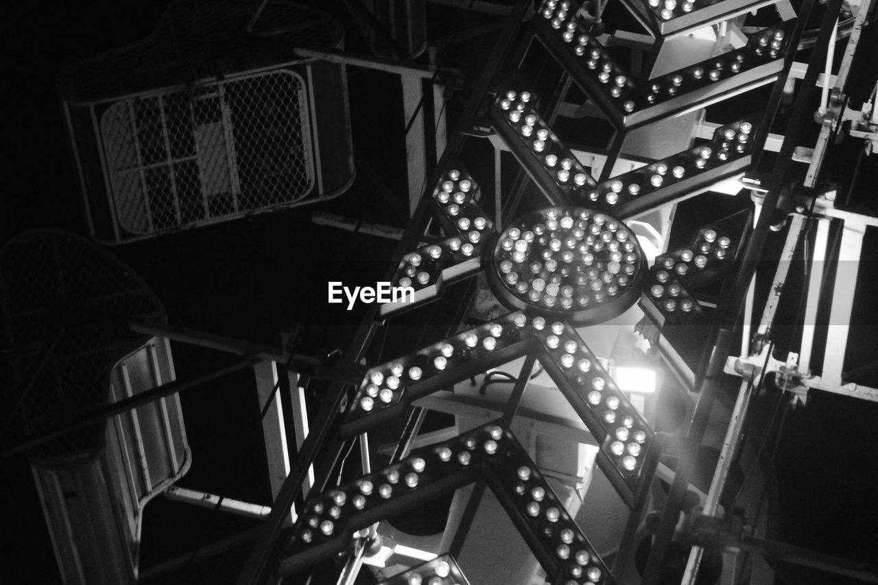 LOW ANGLE VIEW OF ILLUMINATED LIGHTS