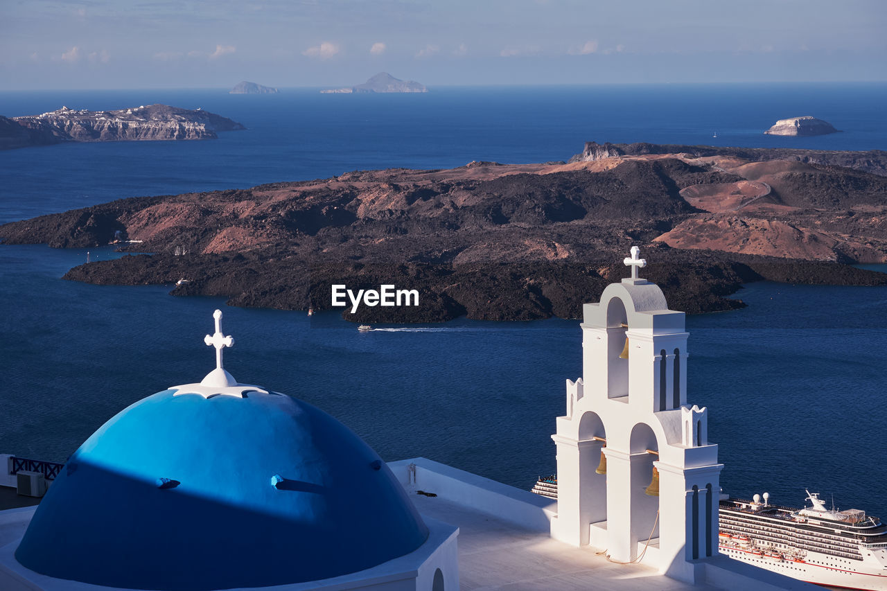 The famous agios theodoros church know as three bells of fira, santorini island, greece