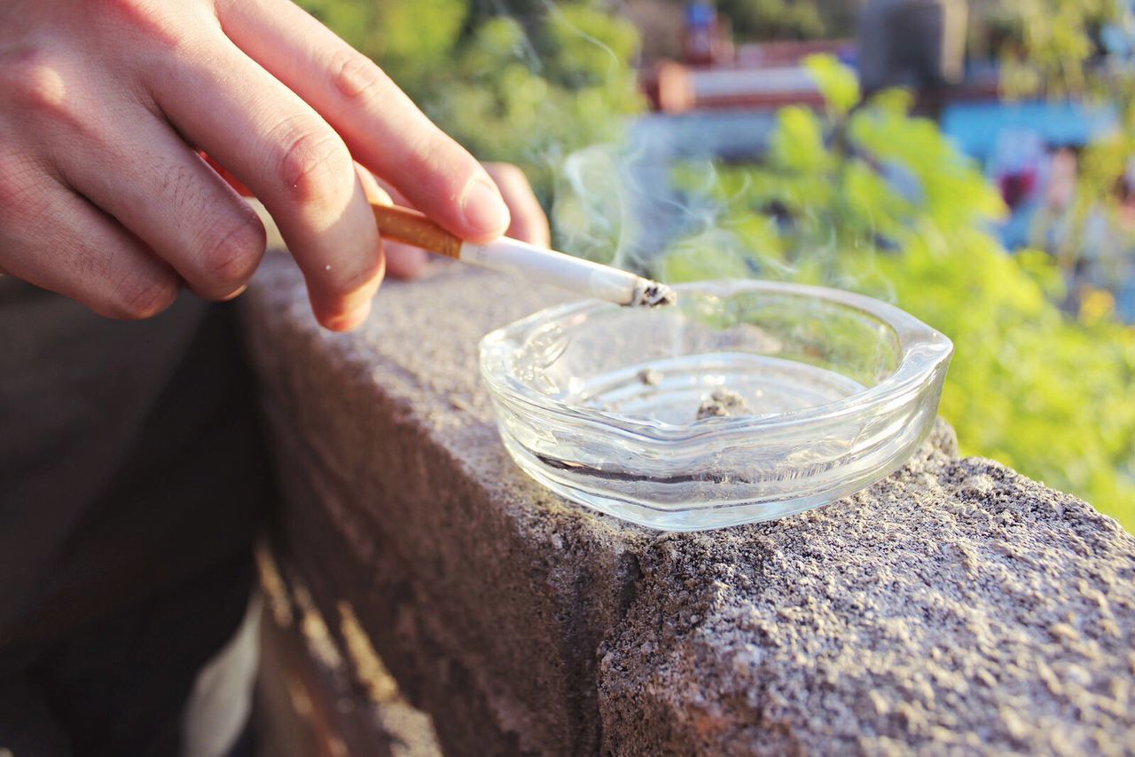 Close-up of person smoking