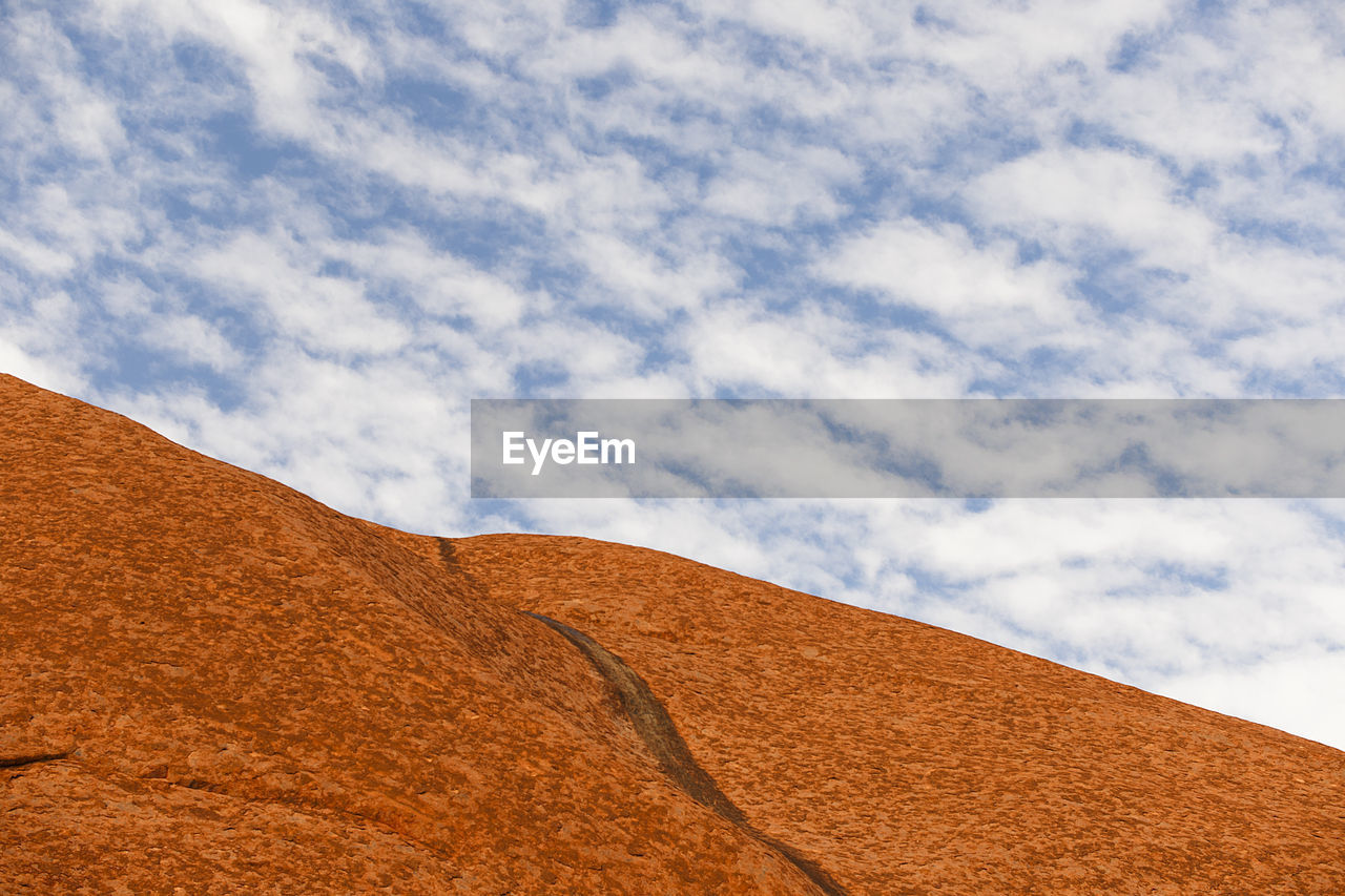 Low angle view of desert against sky