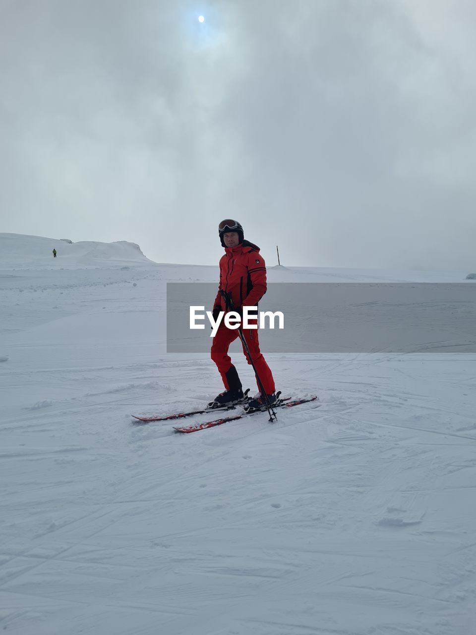 Full length of man skiing on snow against sky