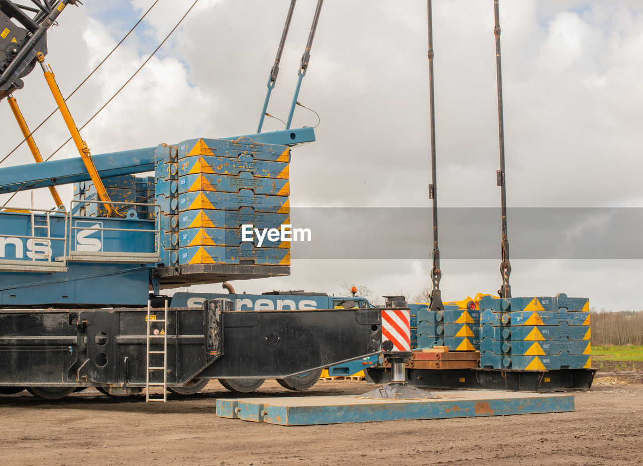 CRANE AT CONSTRUCTION SITE