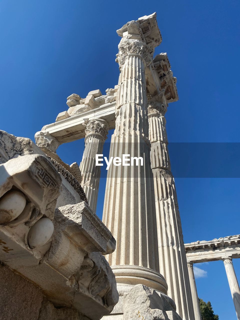 LOW ANGLE VIEW OF A STATUE OF A TEMPLE