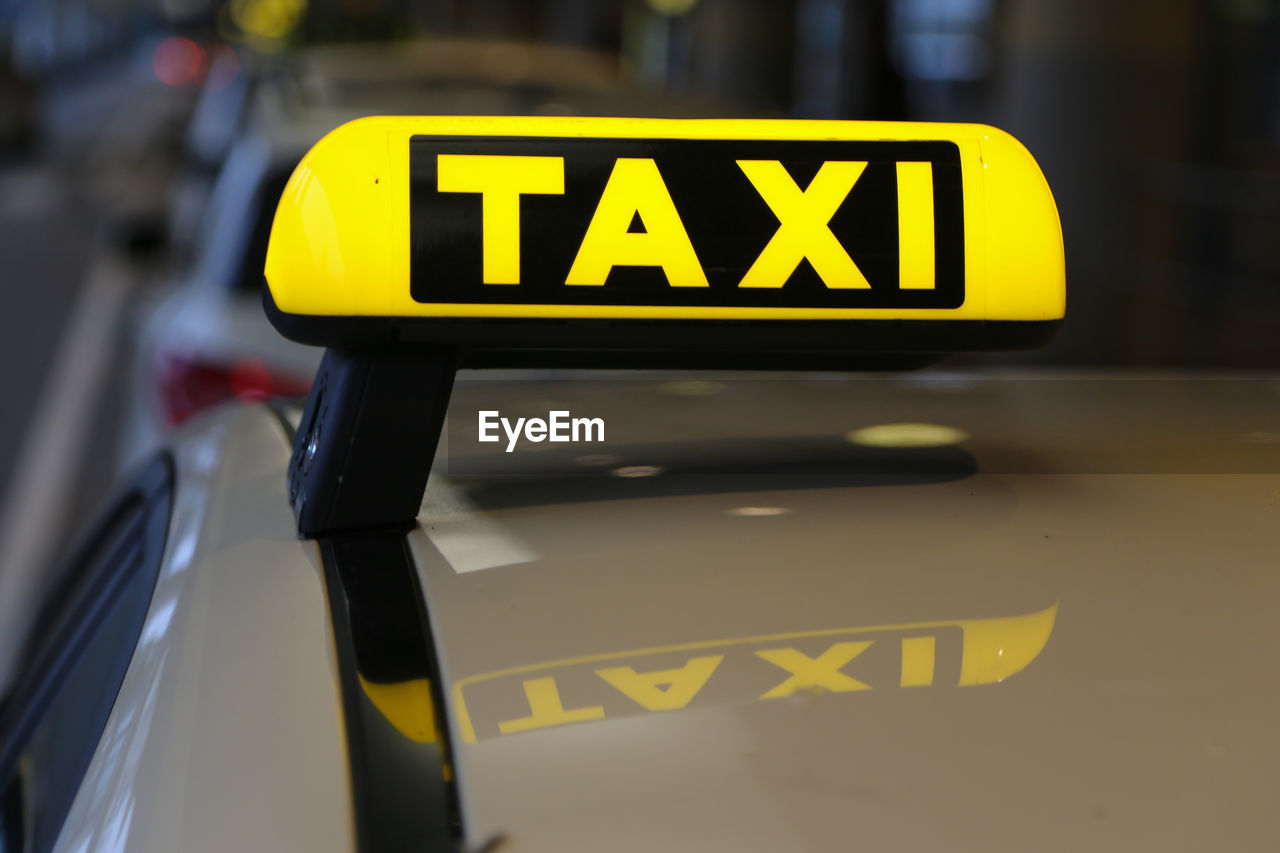 Taxi sign on yellow cab in germany