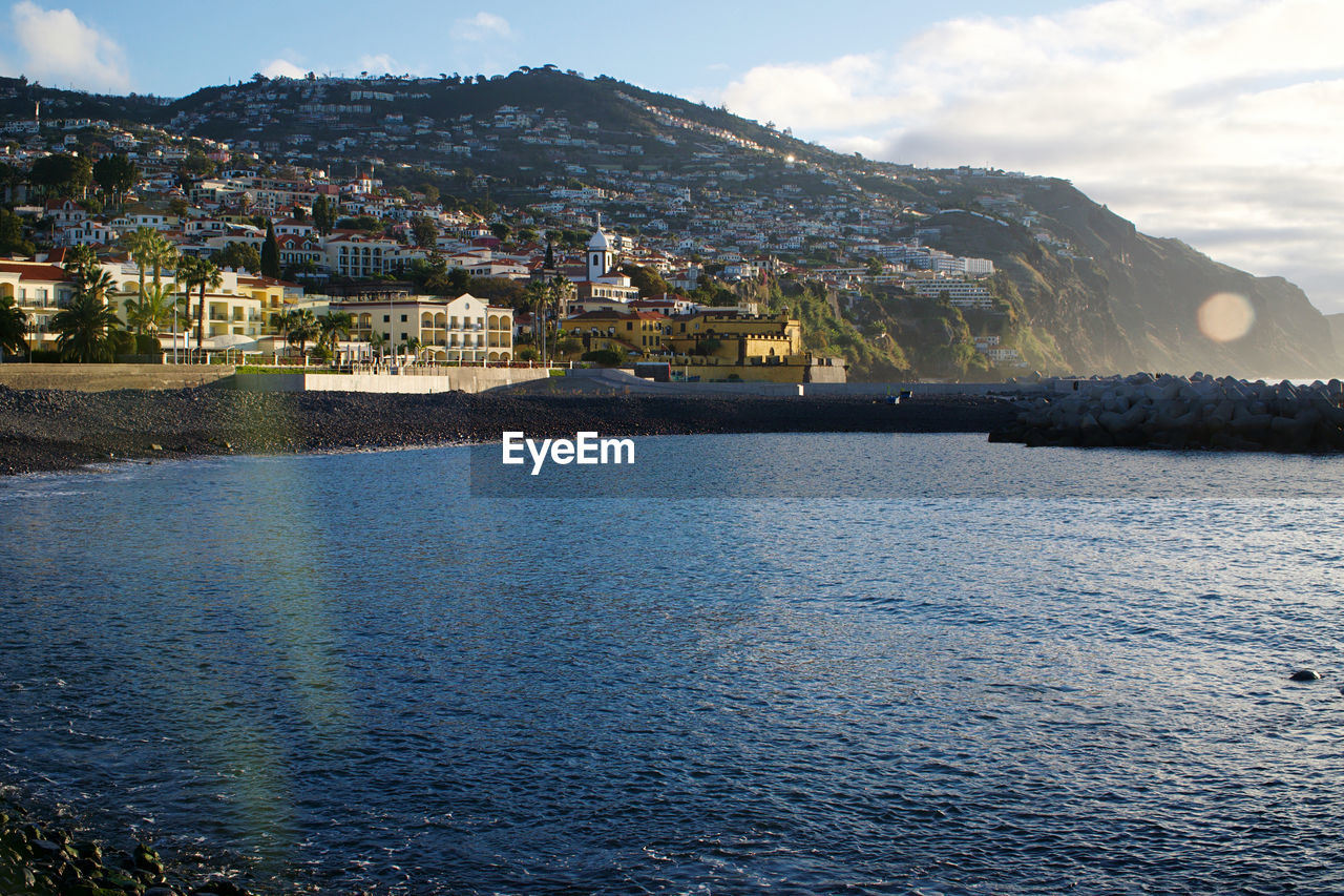 CITY BY SEA AGAINST SKY