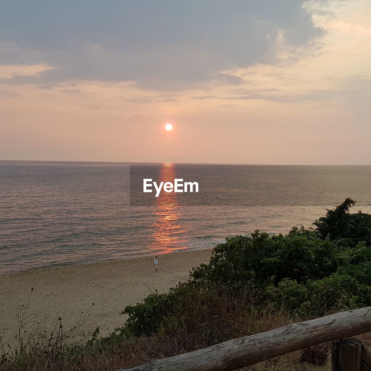 SCENIC VIEW OF SEA DURING SUNSET