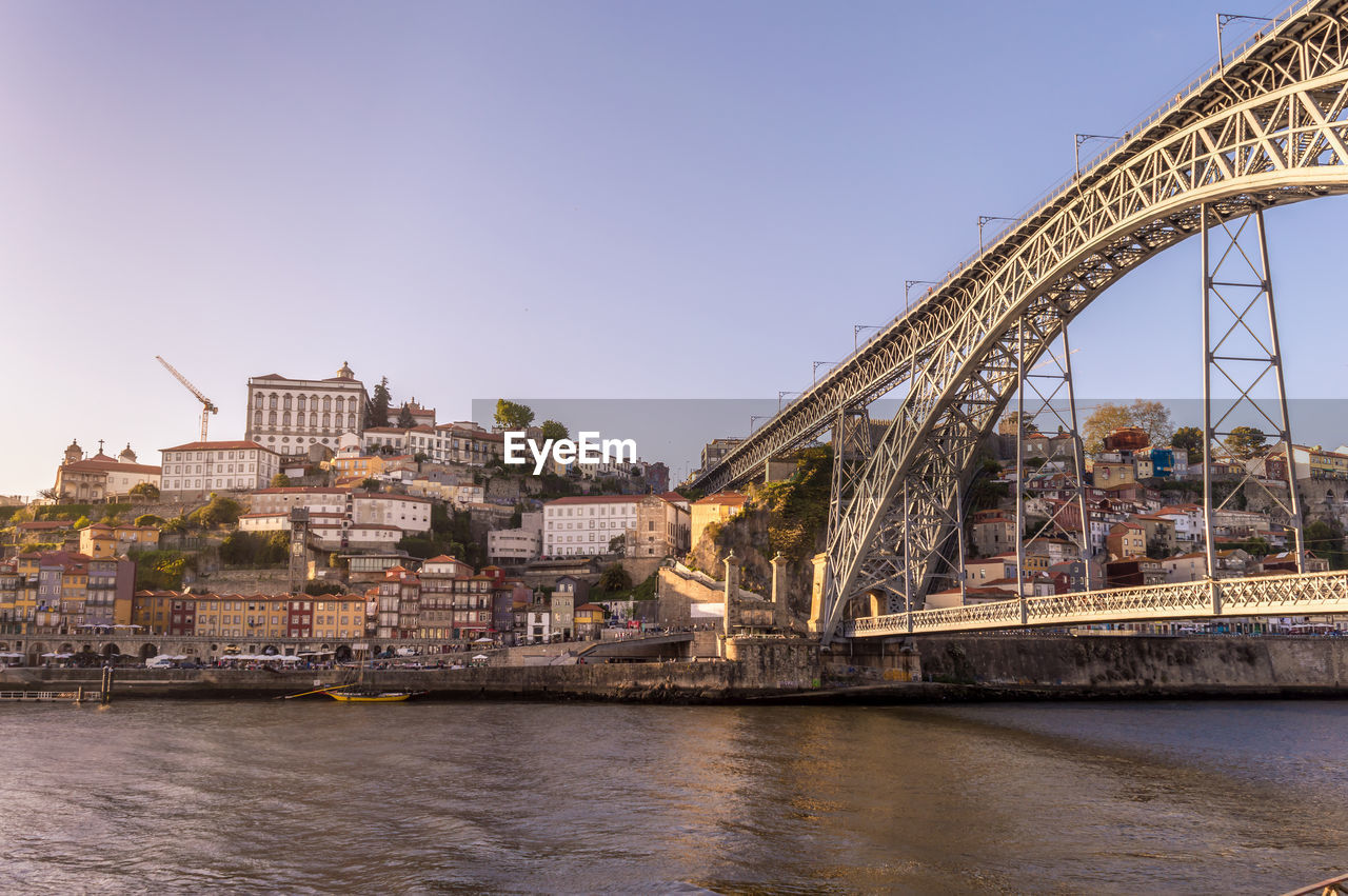 Low angle view of dom luis i bridge over douro river in city