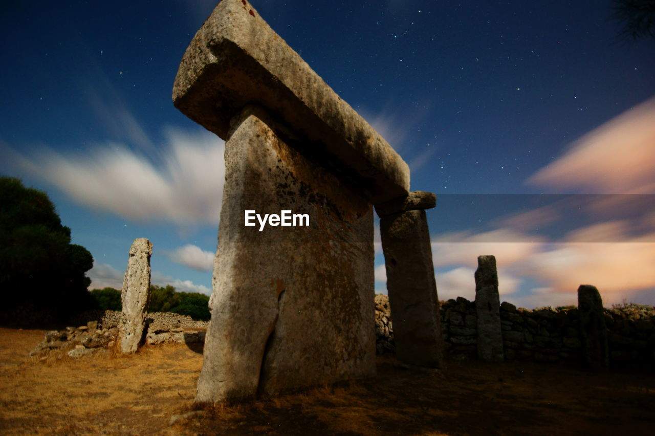 Low angle view of old ruins against sky at night