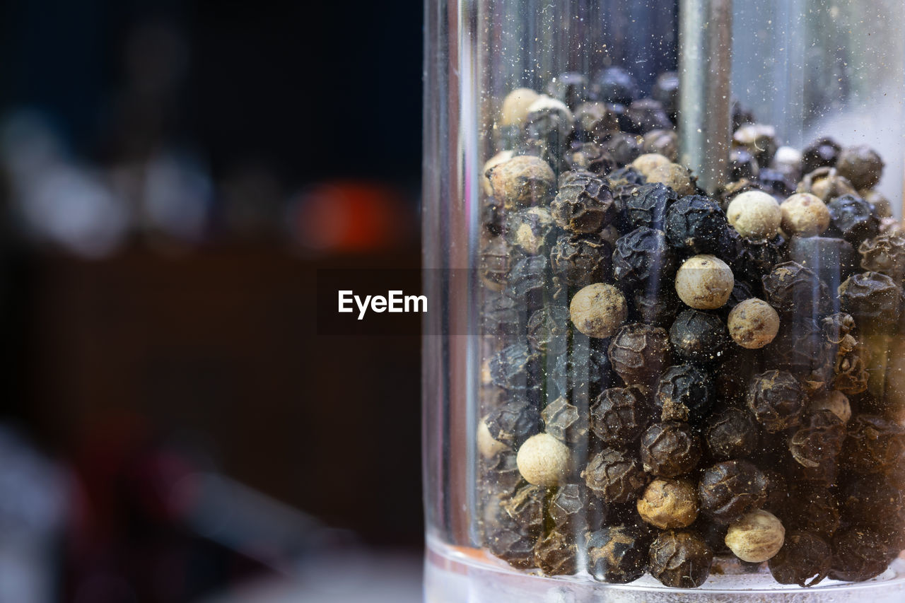 CLOSE-UP OF EGGS IN GLASS CONTAINER