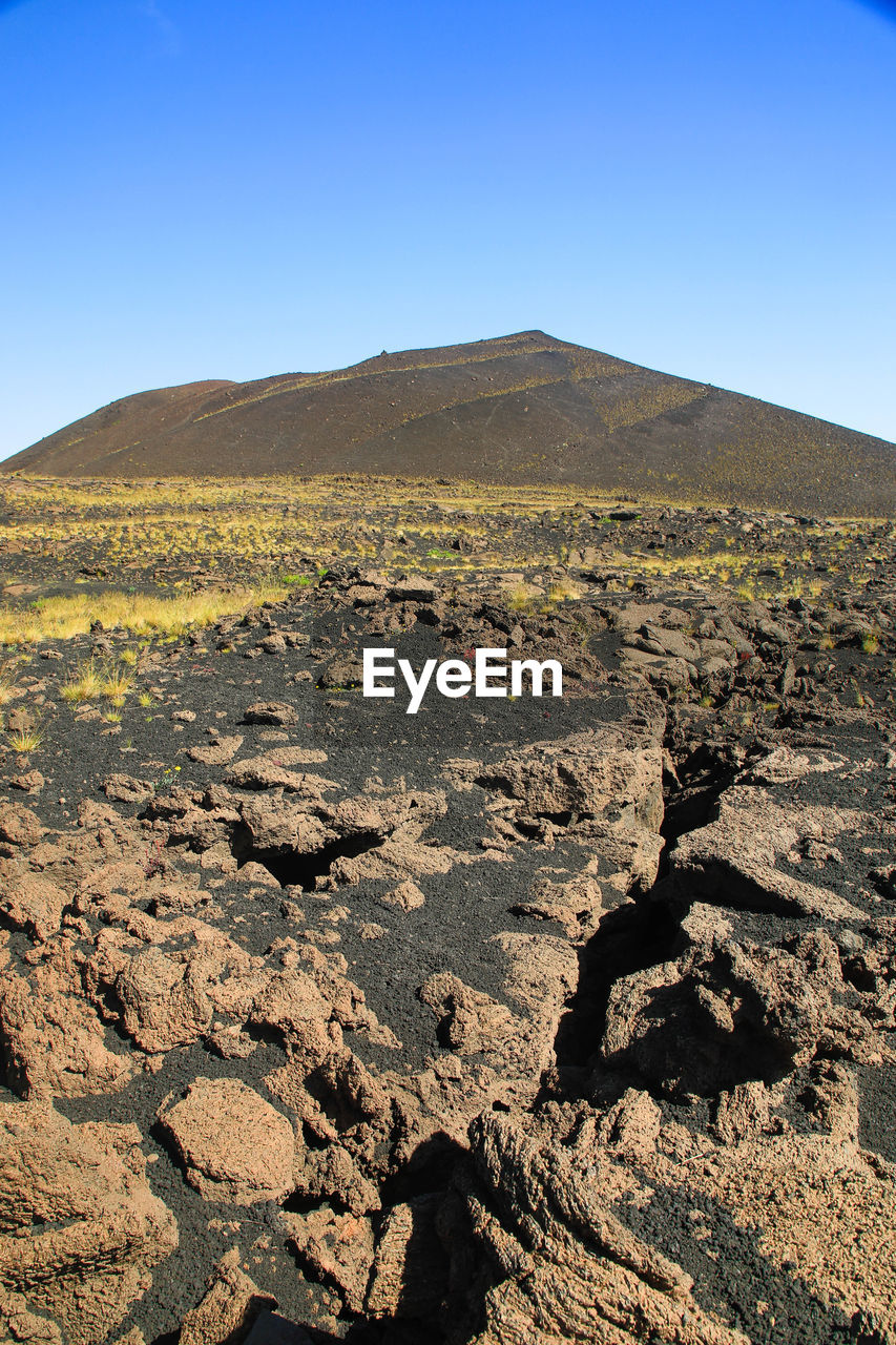 Etna detail of eccentric  volcano crater and fracture floor - landscape summer time