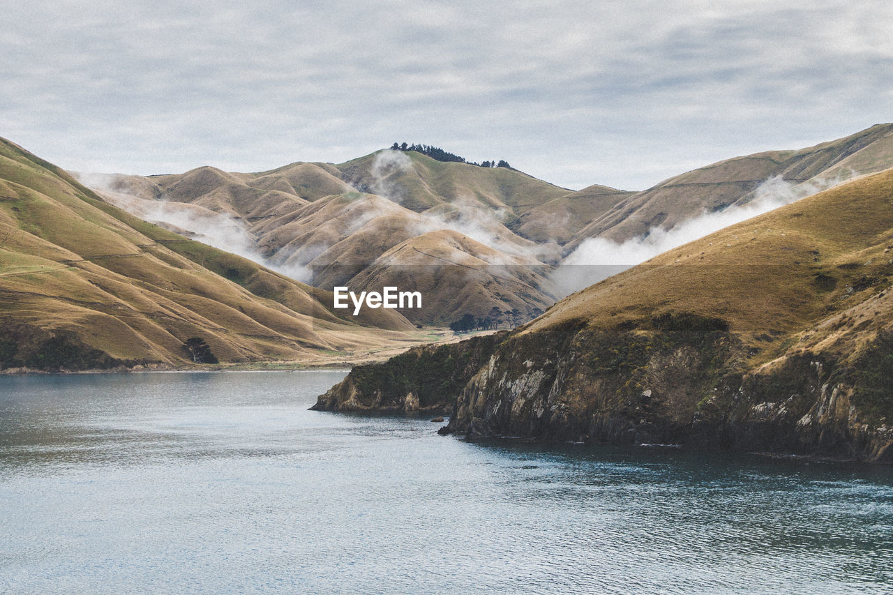 Scenic view of mountains against sky during winter