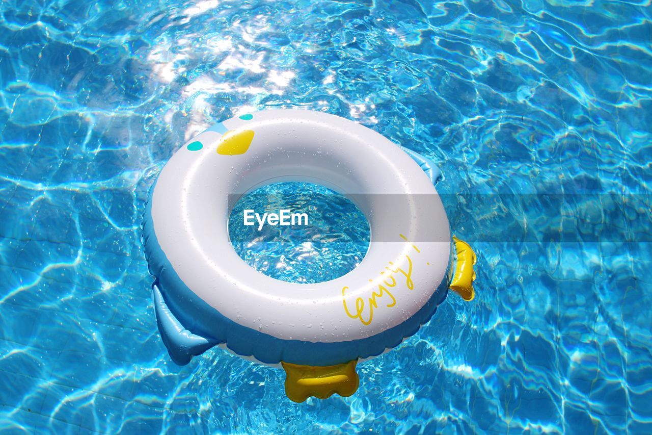 High angle view of inflatable ring in swimming pool