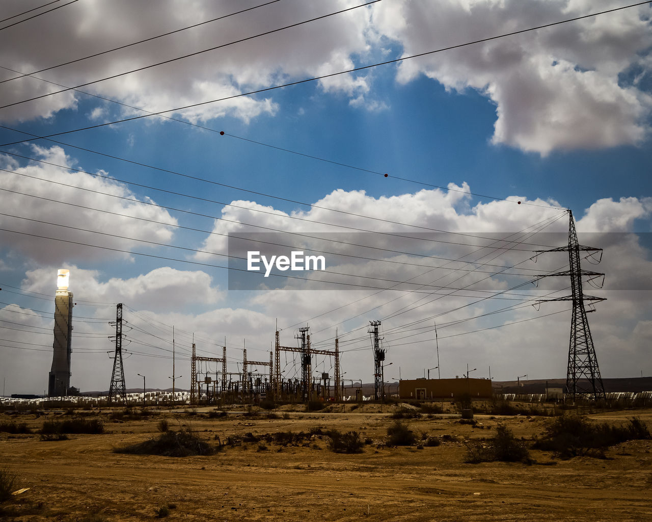 LOW ANGLE VIEW OF ELECTRICITY PYLON AGAINST SKY