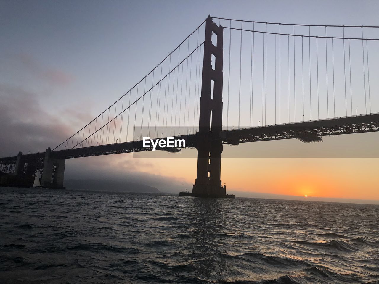 VIEW OF SUSPENSION BRIDGE IN SEA