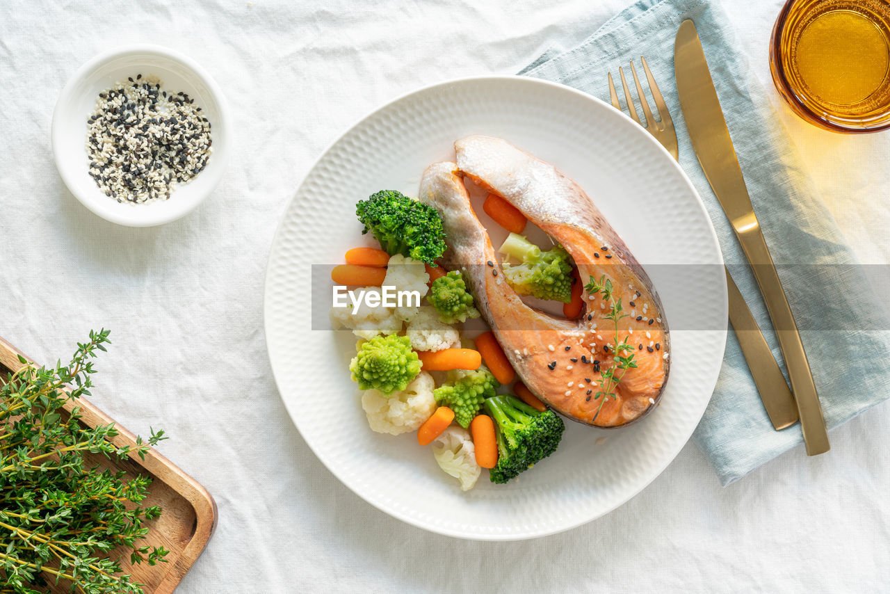 Steam salmon and vegetables, top view. paleo, keto, fodmap, dash diet. mediterranean diet 