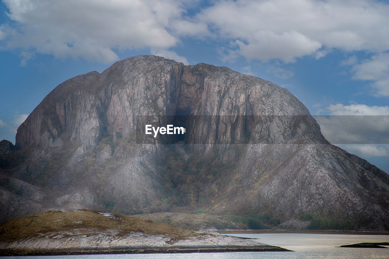 rock, cloud, sky, mountain, water, environment, nature, landscape, sea, scenics - nature, beauty in nature, land, reflection, no people, travel destinations, volcano, wilderness, outdoors, geology, travel, coast, non-urban scene, tranquility, day