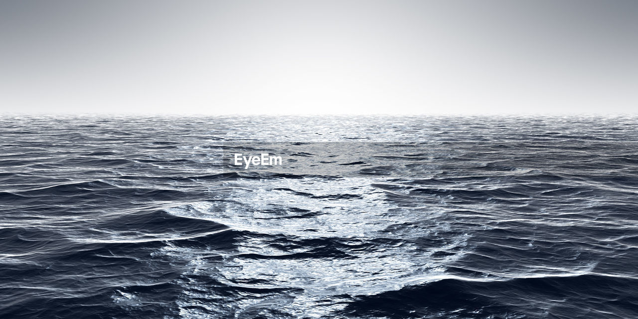 SEA AGAINST CLEAR SKY