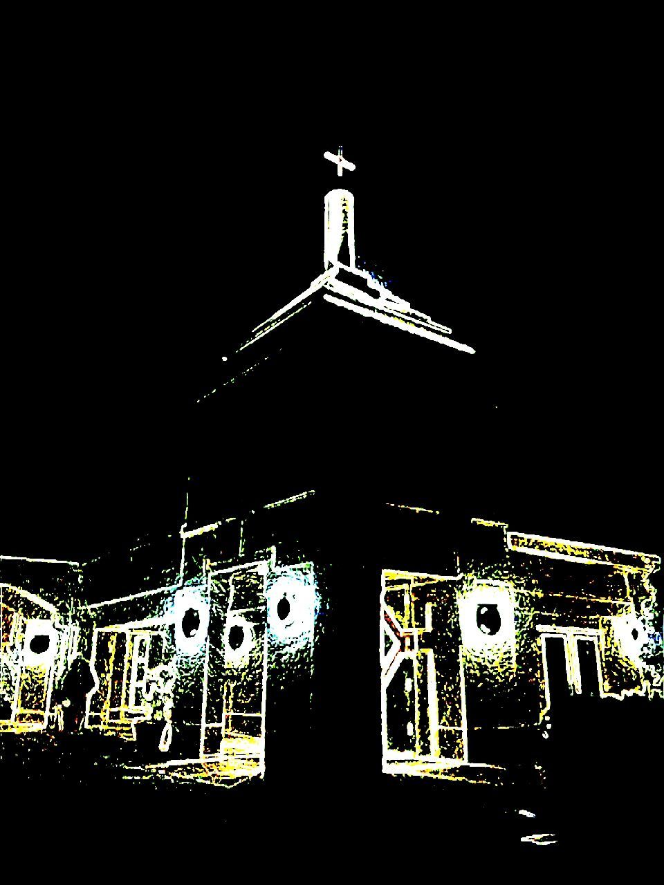 LOW ANGLE VIEW OF CHURCH WITH TREES IN BACKGROUND