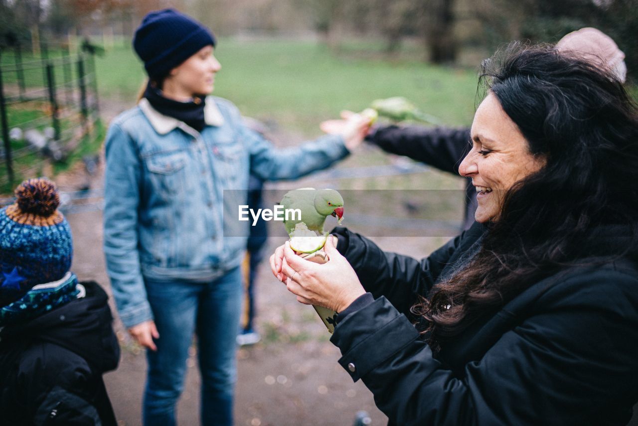 MAN AND WOMAN HOLDING ICE