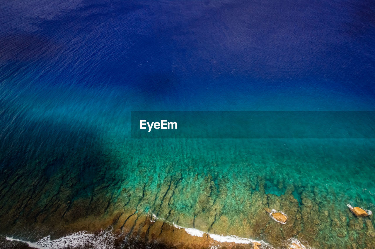 SCENIC VIEW OF SEA AND BLUE SKY