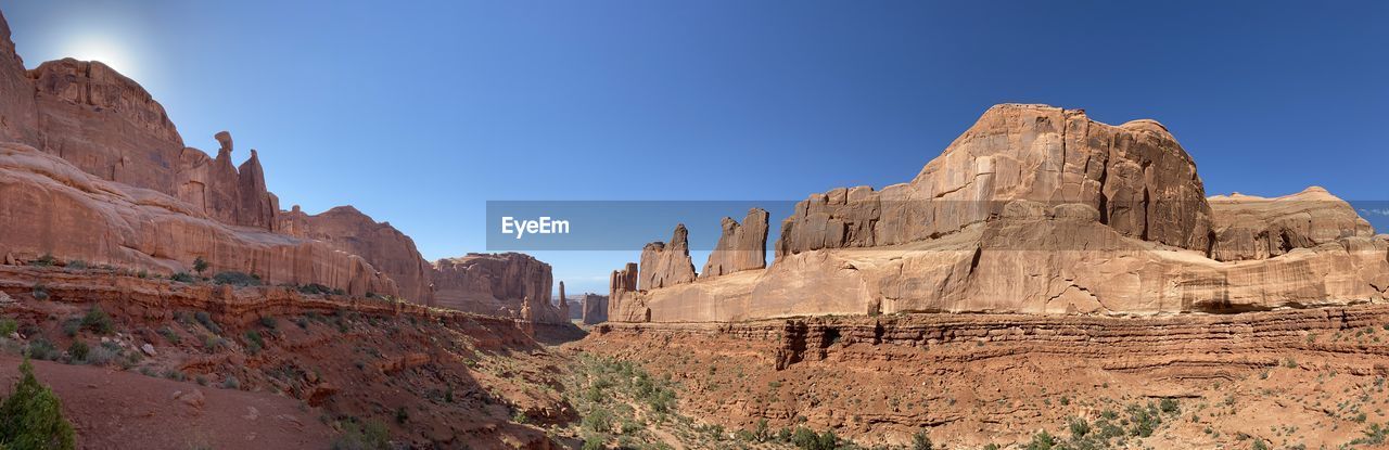 ROCK FORMATIONS AGAINST SKY