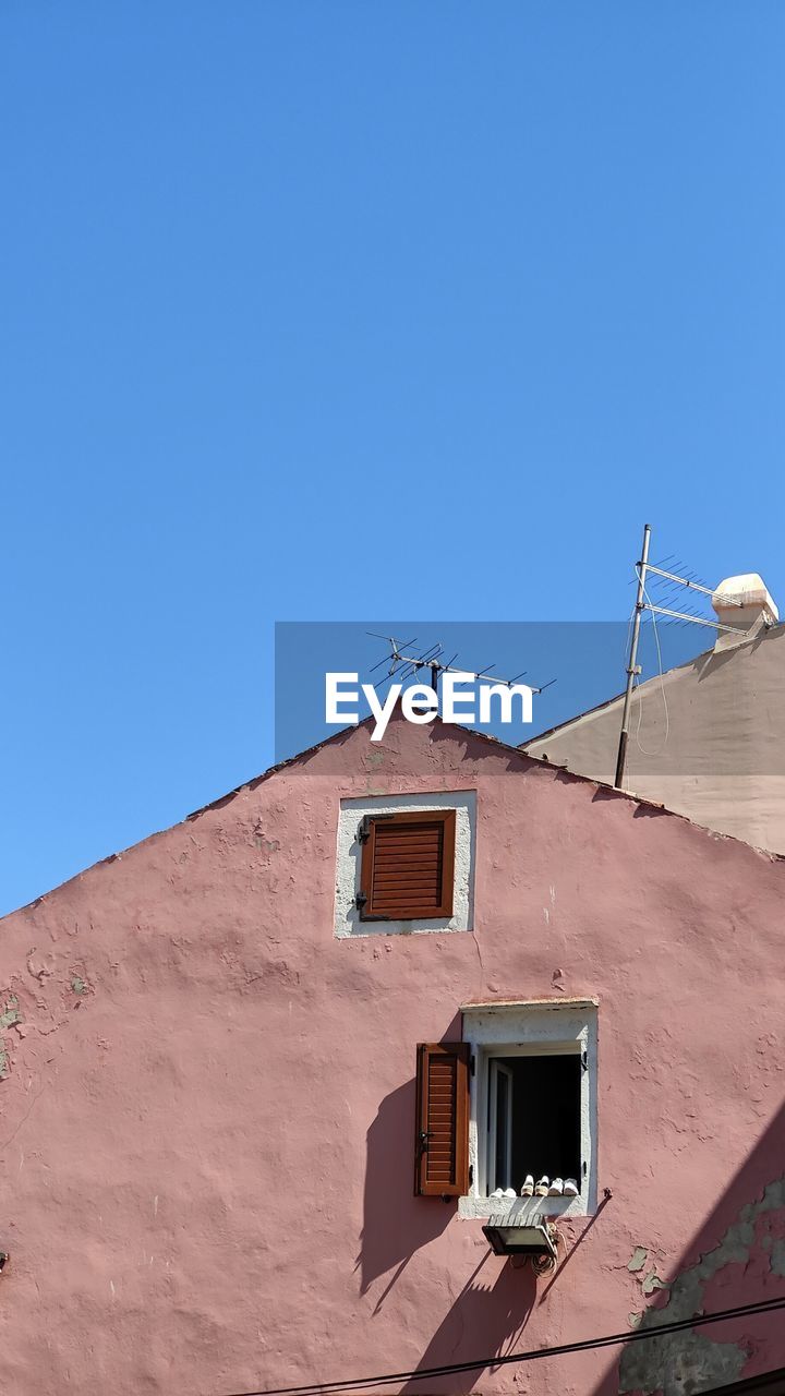 Croatian house against clear blue sky