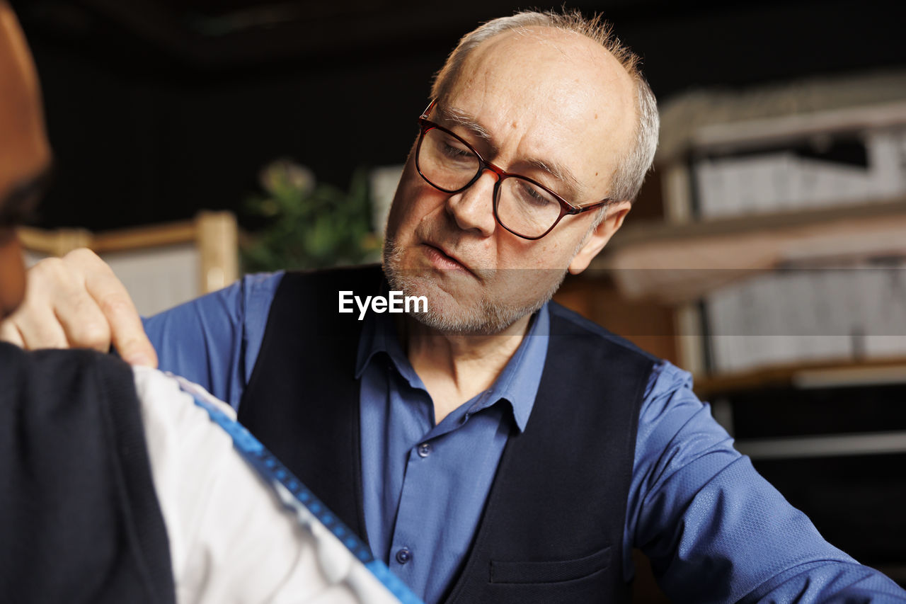 portrait of senior man looking away