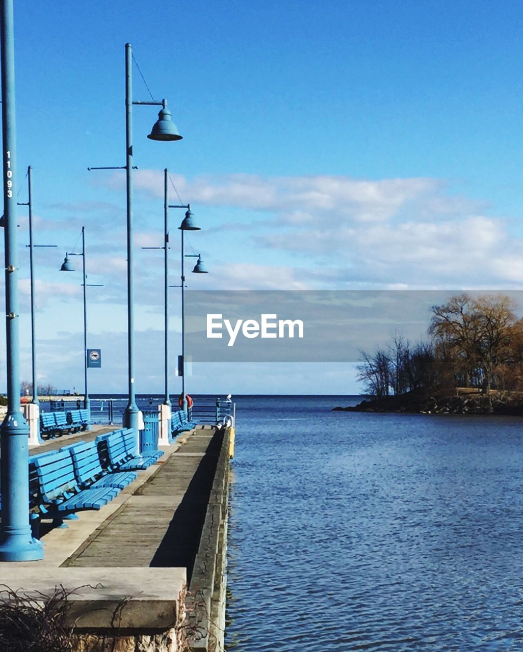 Scenic view of sea against blue sky