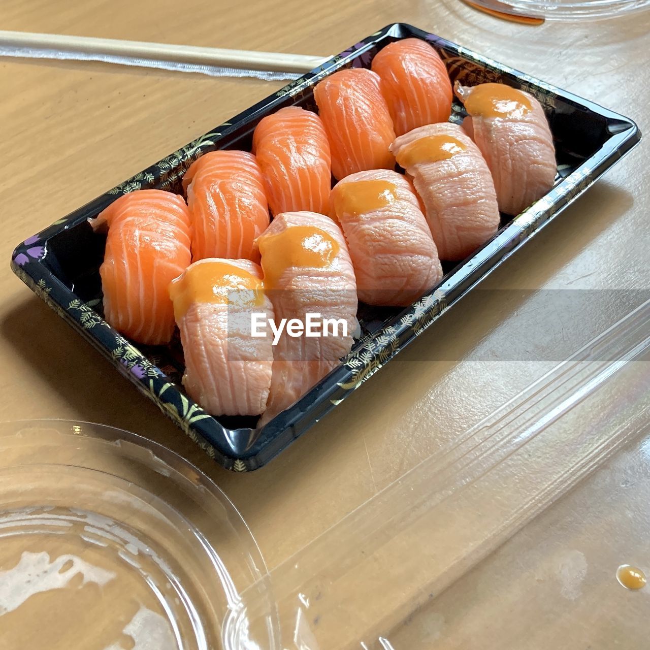 food, food and drink, asian food, japanese food, freshness, seafood, cuisine, healthy eating, wellbeing, culture, indoors, no people, high angle view, rice, still life, sushi, container, chopsticks, dish, tray, meal, table, japanese cuisine, fish, raw food