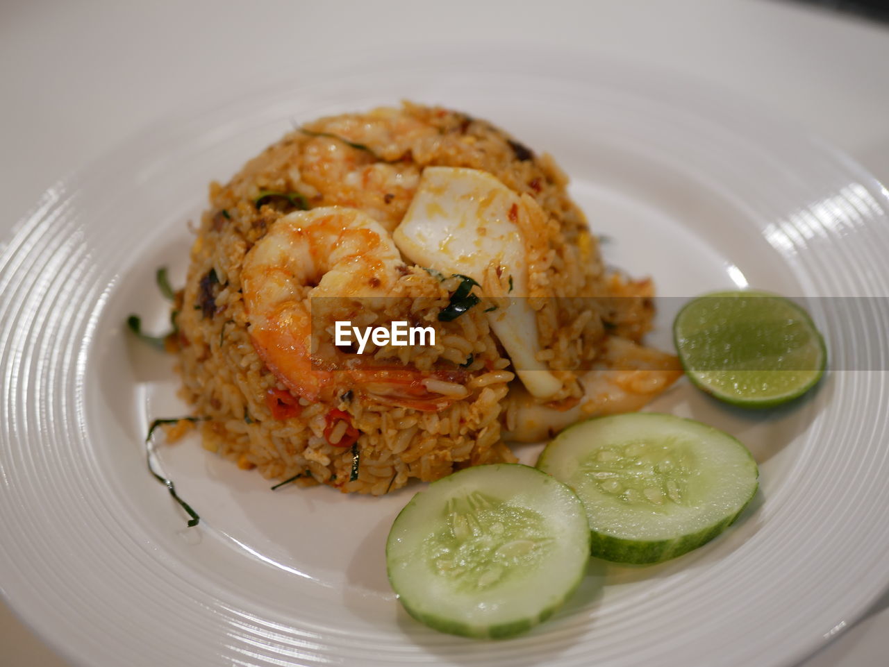 High angle view of rice in plate on table