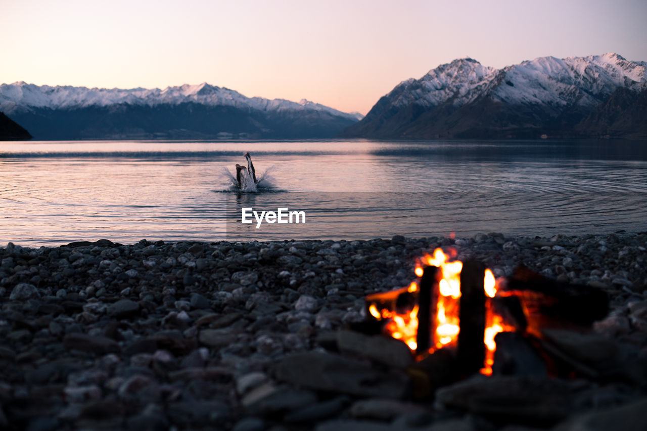 Scenic view of lake during sunset