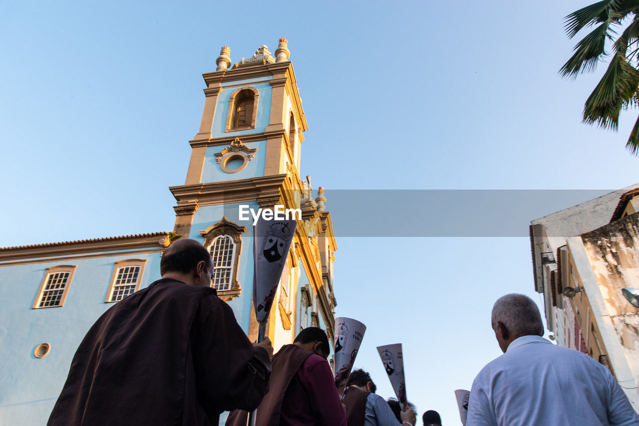 Catholics are seen climbing the pelourinho hill during the easter week procession