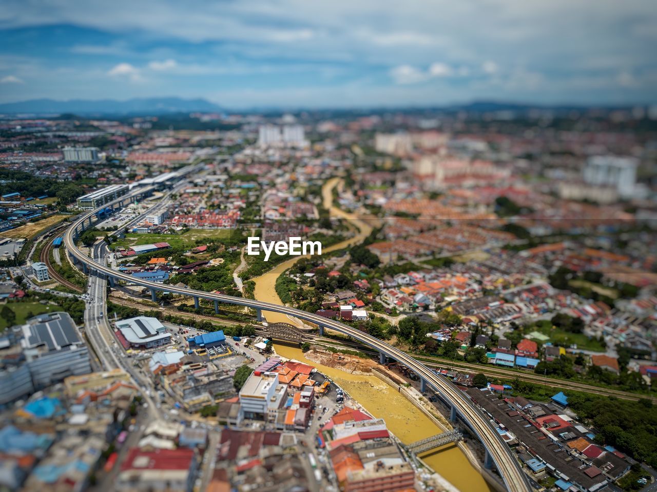 Aerial view of cityscape against sky