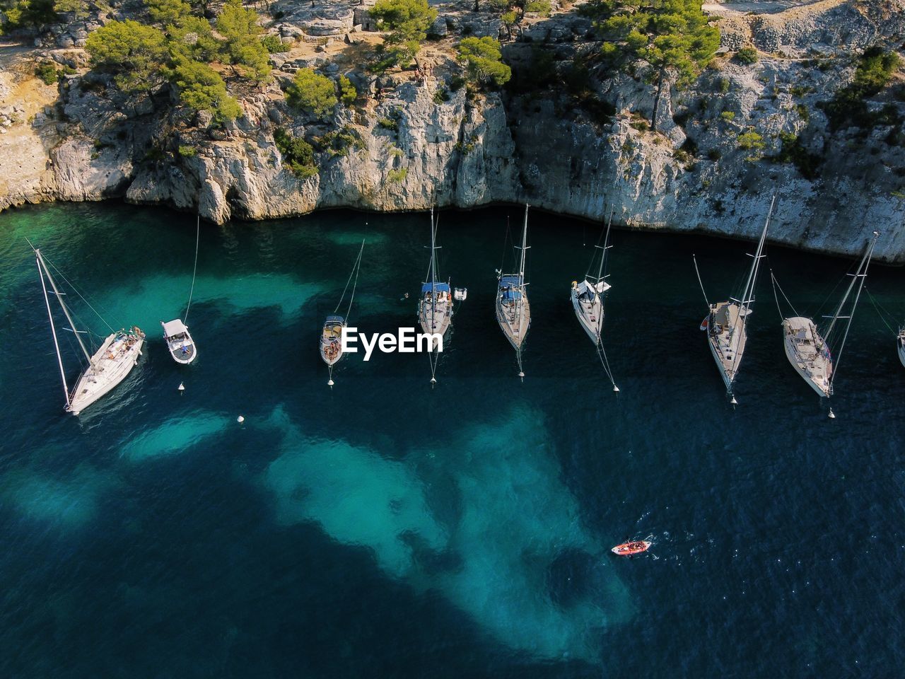 High angle view of sailboats in sea