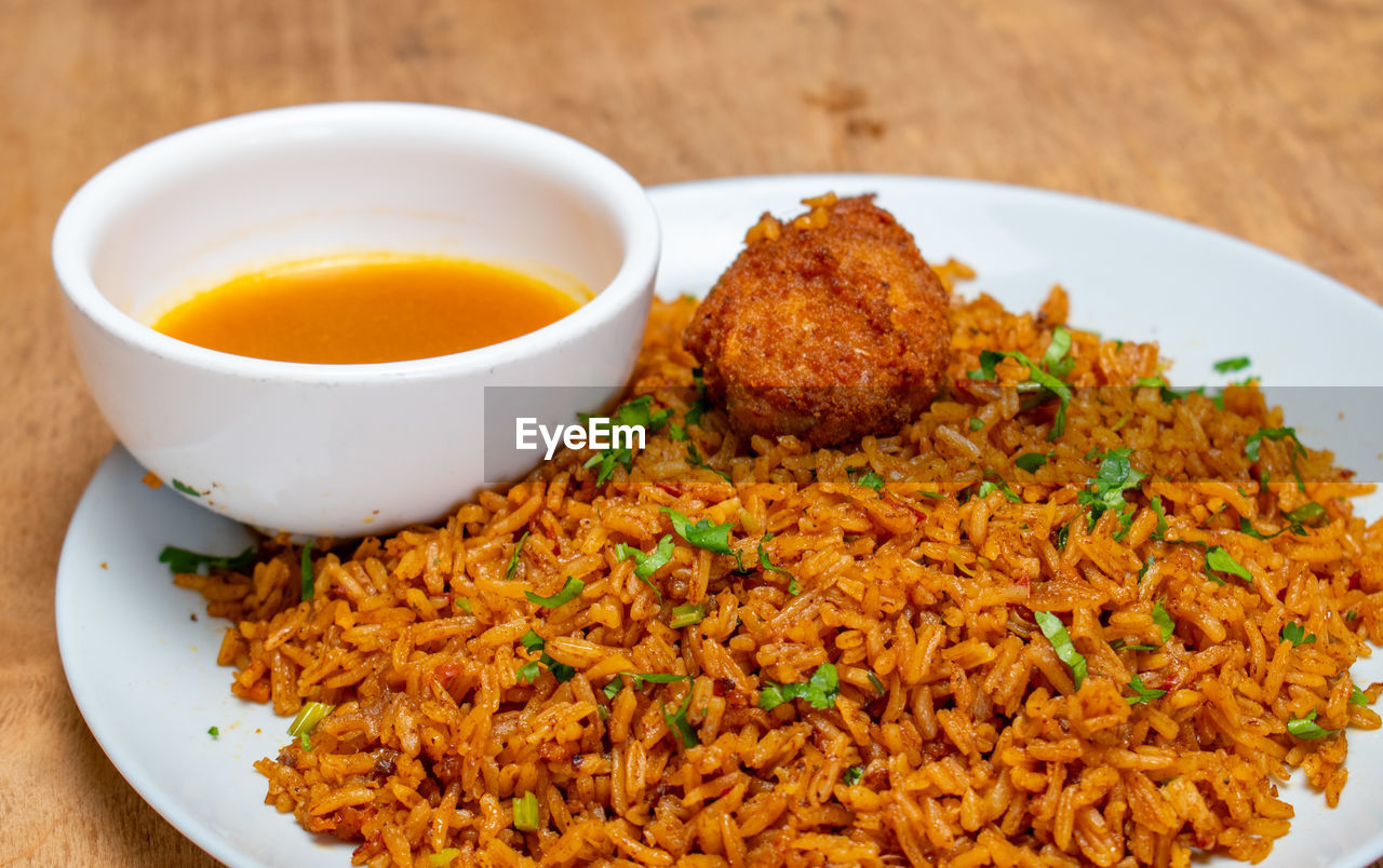 food and drink, food, dish, asian food, healthy eating, wellbeing, plate, freshness, indian food, cuisine, meal, spice, produce, crockery, bowl, no people, vegetable, condiment, fried, herb, indoors, table, wood, sauce, close-up, savory food, snack, meat, studio shot, gourmet