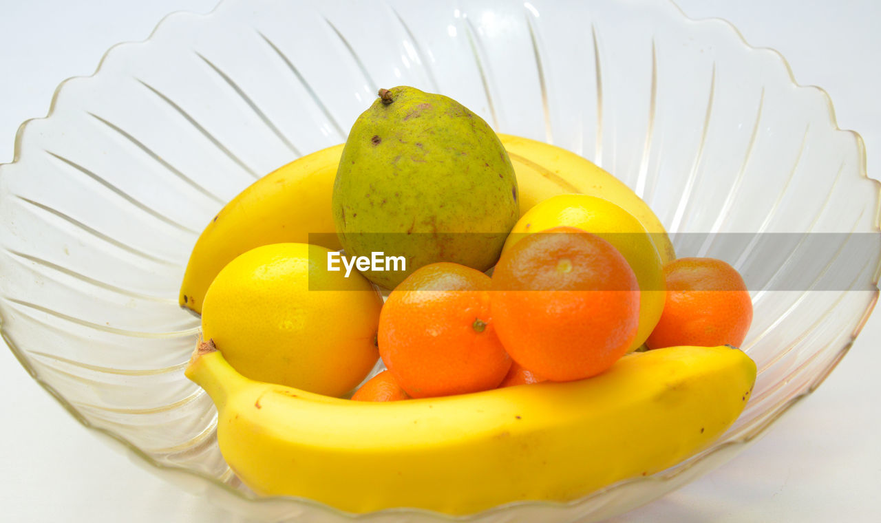 CLOSE-UP OF FRUITS ON PLATE