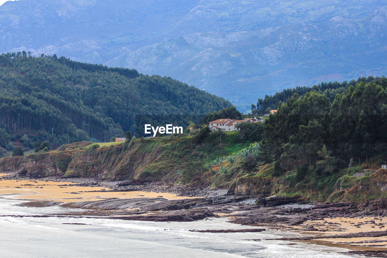 Scenic view of sea and mountains