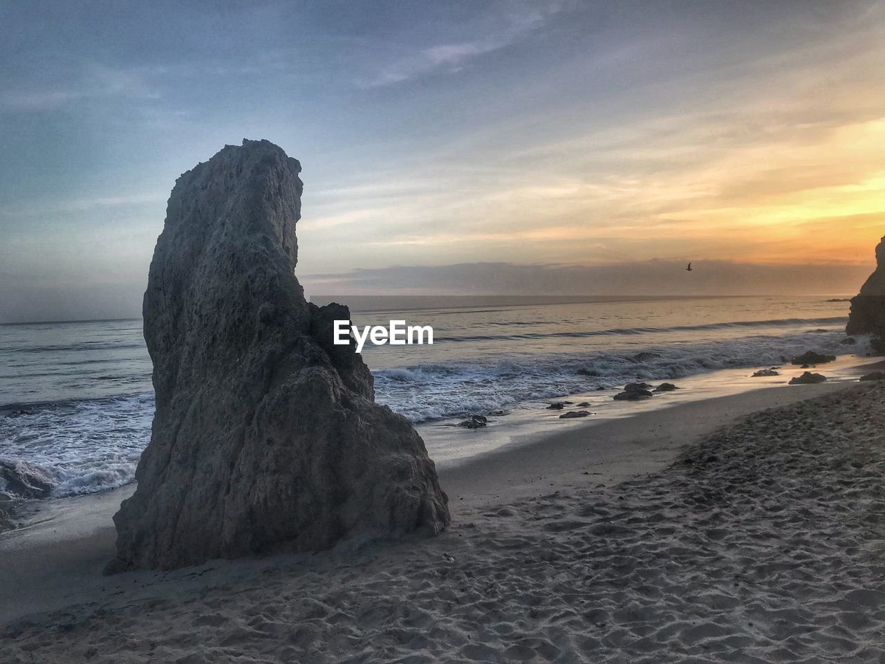 SCENIC VIEW OF SEA DURING SUNSET