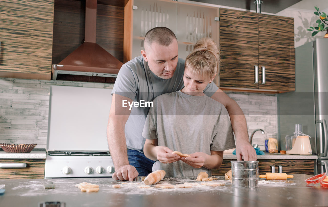 FATHER AND DAUGHTER AT HOME