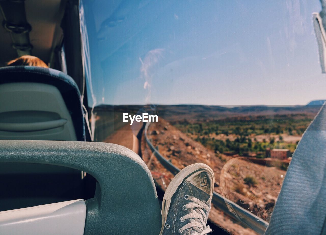 Low section of man traveling in bus