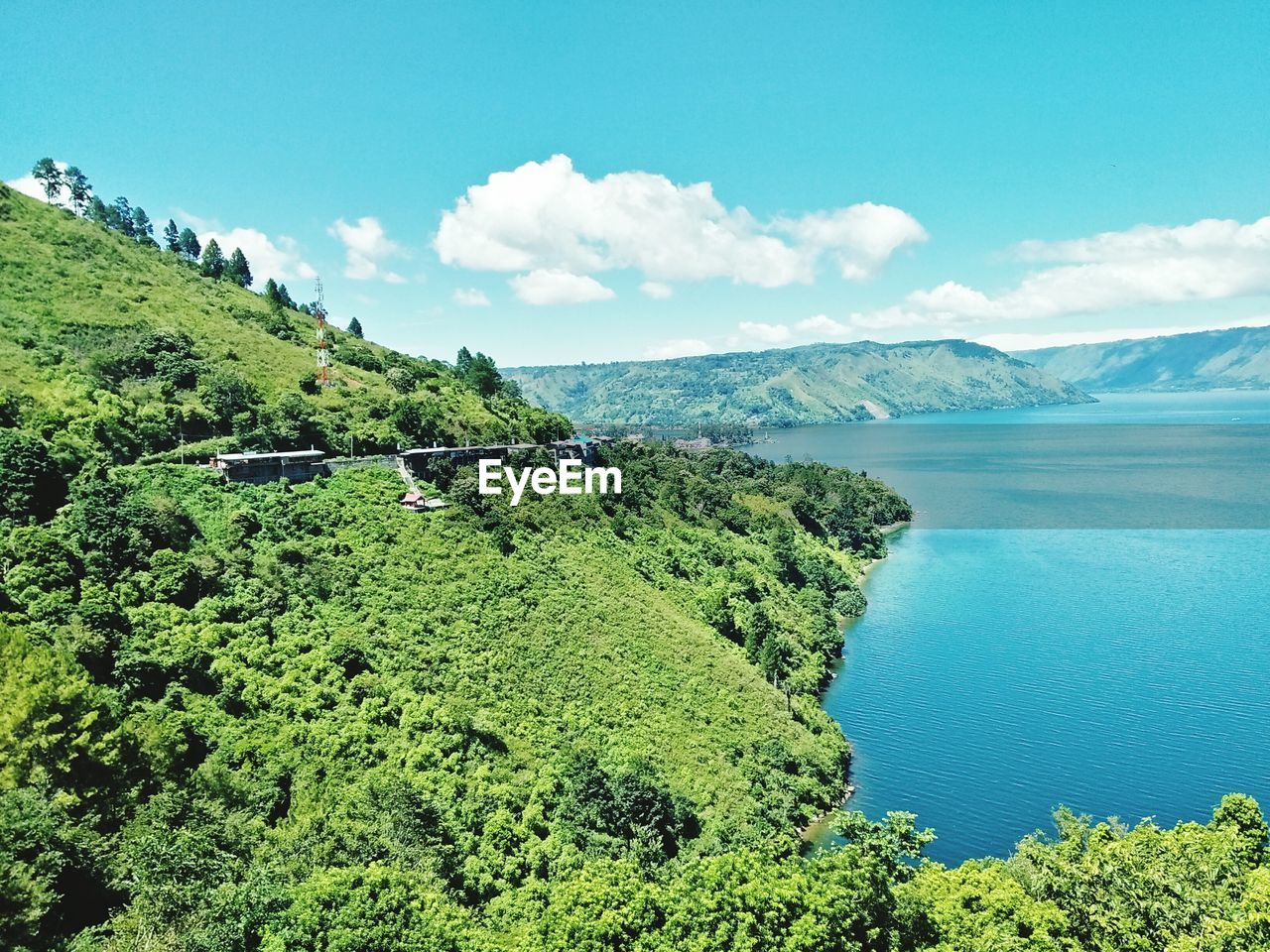 SCENIC VIEW OF LAND AND MOUNTAINS AGAINST SKY